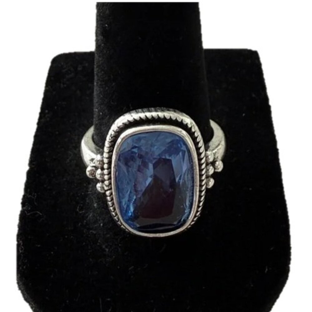 Silver Tone Ring with Blue Faceted Stone